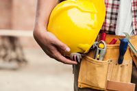 close-up-hard-hat-holding-by-construction-worker